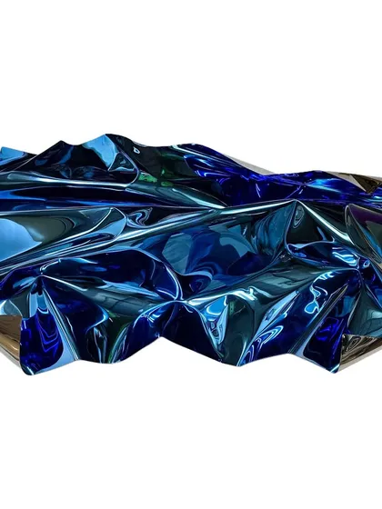 "Meteor 119" is a study in monochrome. This stainless steel wall installation is finished in a striking, electric blue that captures fluidity and reflection.