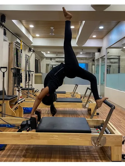 A powerful and graceful backbend on the Reformer. This advanced pose showcases the incredible strength and flexibility that can be achieved through consistent practice.