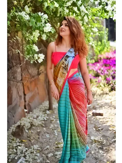 This vibrant look was for a farewell party, where the makeup needed to match the colorful saree. I created a look with a pop of color on the eyes and a flawless base, ensuring she stood out while looking elegant and age-appropriate.
