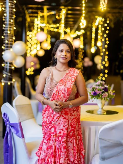 Another shot of Bhavya's party look. The lighting highlights the soft shimmer on her skin.