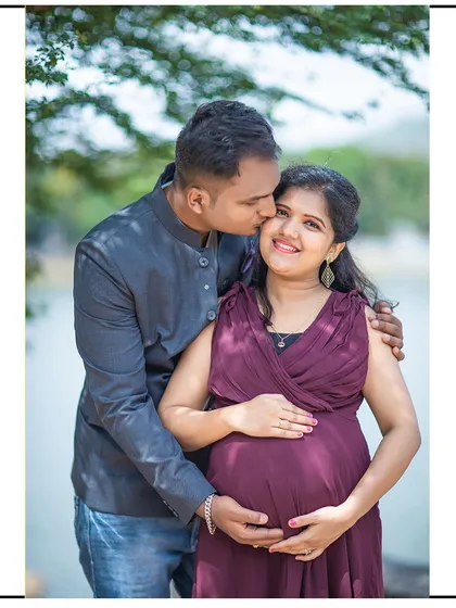 A close-up of a happy couple, filled with smiles and the excitement of their journey to parenthood.