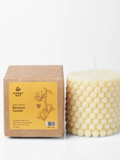 A clean e-commerce shot of a beeswax bubble candle against a pure white background. These shots are essential for Amazon, Flipkart, and other online marketplaces.