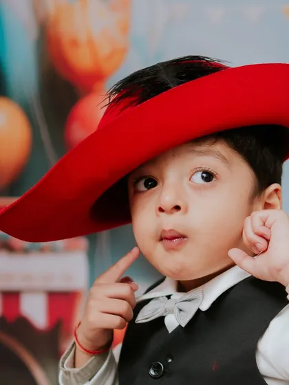 A close-up of our little carnival star. His expressive face and dapper outfit made this second birthday shoot so much fun.