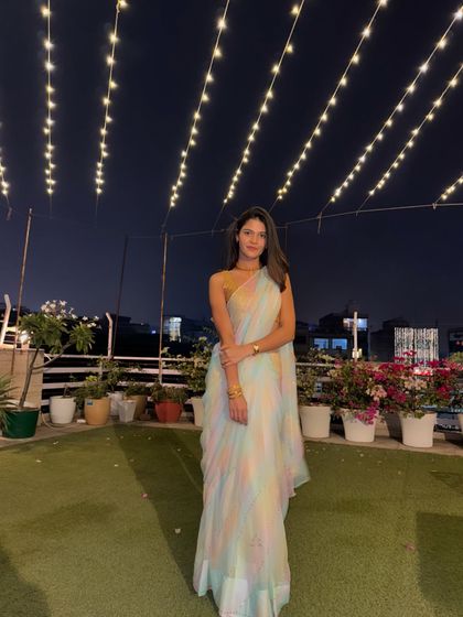A full shot of my Diwali look. The pastel saree paired with a simple gold blouse and minimal jewelry is an example of elegant and understated festive styling.