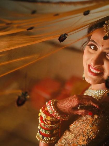 Mitali Jain - Bridal Makeup & Styling Classic Red & Gold Bridal Looks photo 15