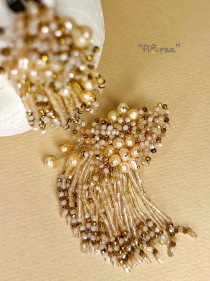 I designed these floral earrings with freshwater pearls and a golden touch to be a stunning, versatile piece for any wardrobe.