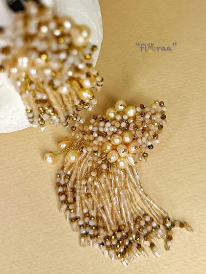I designed these floral earrings with freshwater pearls and a golden touch to be a stunning, versatile piece for any wardrobe.