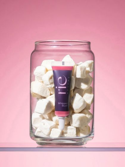 Another take on the "whipped" concept, this time with a different texture. Placing the blush inside a jar of marshmallows creates a sweet, playful, and unexpected visual that grabs attention.