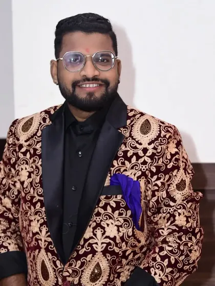 A simple, confident portrait before a show. I am ready to provide a comedy and colorful unique magic show for guests from kids to adults.