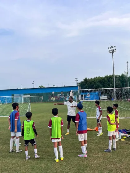 A coach directing his players during a training drill. We provide constant feedback to help players improve their decision-making in real-time.