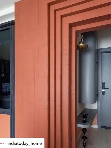 The entrance foyer of 'A Den', with its grand, terracotta-tiled archway, as featured in India Today Home.