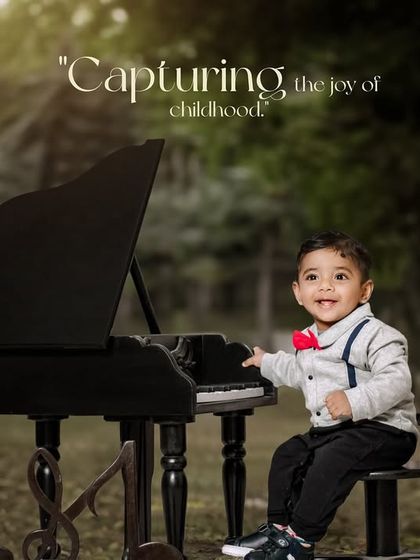 Capturing the joy of childhood. A boy with a red bow tie and suspenders has a great time playing the piano.