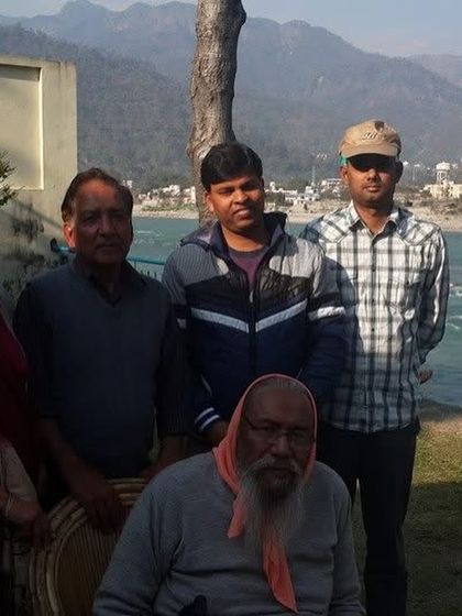 With my Guruji in the Himalayas. His advice that real "seva" (service) is bigger than "paisa" (money) is the foundation of my medical practice and my life.