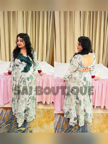 A client looking beautiful in a custom printed gown with a unique backless design. It's all about creating pieces that are as unique as you are.