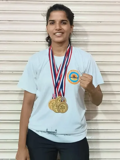Posing with her hard-earned medals, this athlete embodies the strength and determination we cultivate at SSKKA. Each medal represents a challenge overcome and a new level of skill achieved.