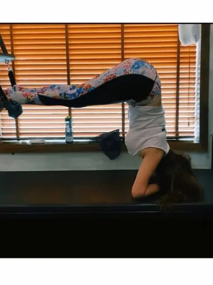 An inverted pike on the Cadillac is a powerful exercise for building core and upper body strength. We guide our clients through progressions to safely and effectively master movements like this.