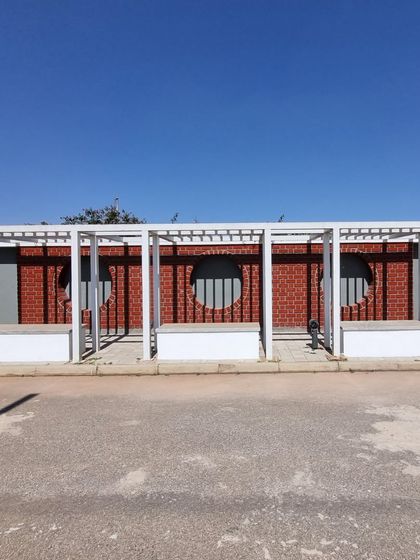 An identical view of the modern pergola structures.