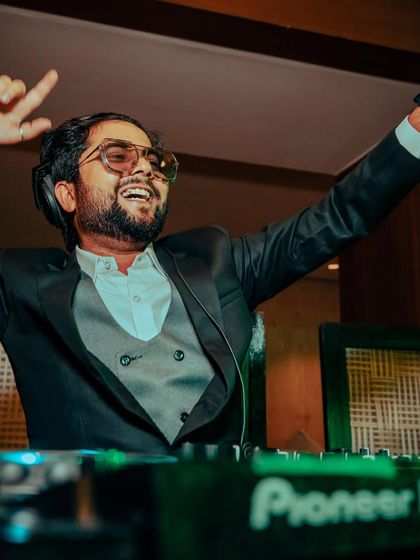 A candid moment of joy behind the decks. I believe in working hard, being honest, and being proud of who you are.