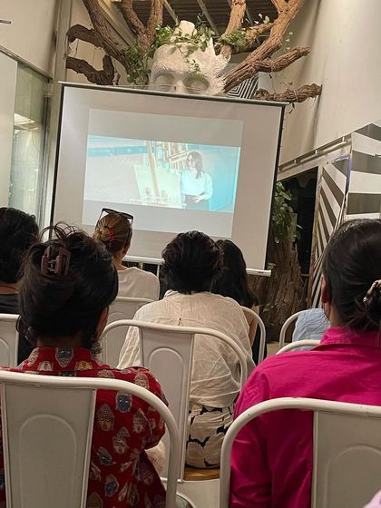 The audience watches the "Radical Creatives" documentary screening in our event space. We love using our venue to host meaningful collaborations that spark important conversations.