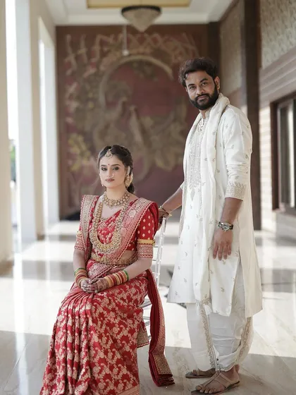 The bride and groom together. Her makeup is designed to be picture perfect, ensuring she looks stunning in all her wedding portraits.