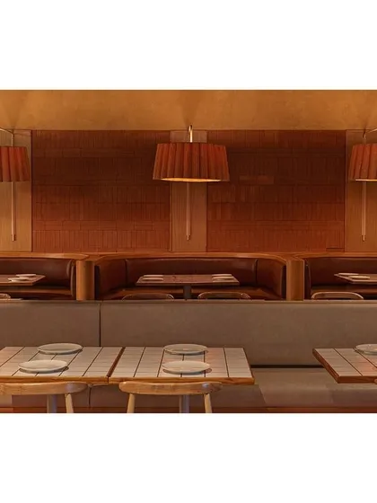 To create a sense of intimacy within the large Biergarten brewery, we designed these cozy seating booths. The warm, earthy palette of terracotta, wood, and ochre lime plaster provides a comfortable and elevated setting for guests to connect.