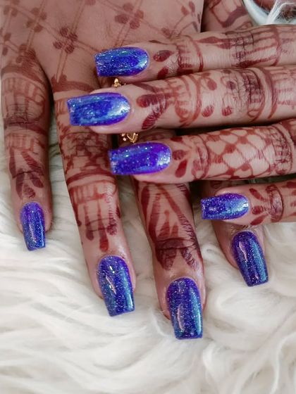 Another view of the sparkling blue glitter extensions.