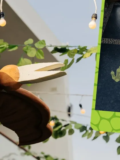 Details matter! A hanging pterodactyl prop and rustic lighting help create a fully immersive prehistoric environment.