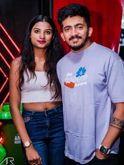 A couple posing for a photo.