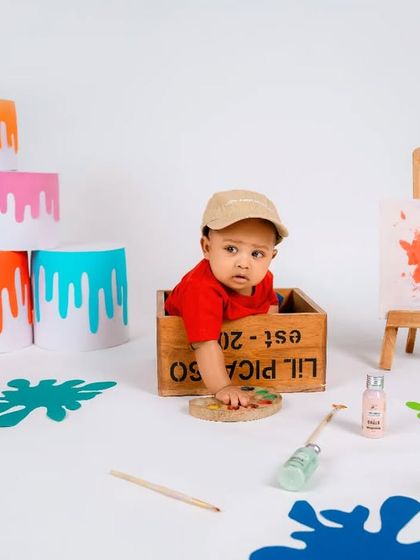 A different perspective on our artist theme. We use various props and angles to create a diverse gallery from a single setup, capturing moments of curiosity and play.