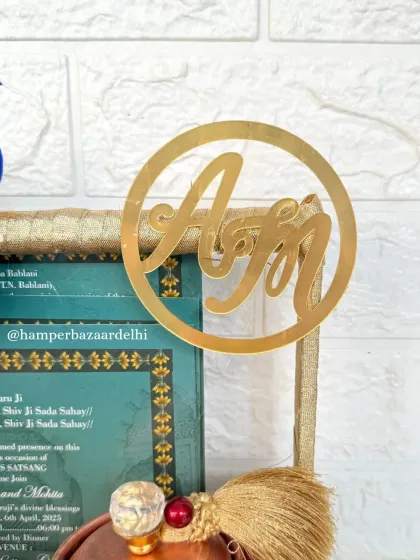 We can even personalize the hamper with the couple's initials, like this beautiful acrylic cutout. It's these little touches that make our hampers unique.