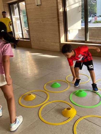 A ring and cone game designed for indoor play. This activity tests speed and precision, and it's a great way to get kids moving in a smaller space.