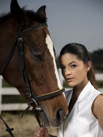 A tighter, more intimate portrait that captures the connection between the model and the horse. This kind of shot adds an emotional layer to a fashion campaign.