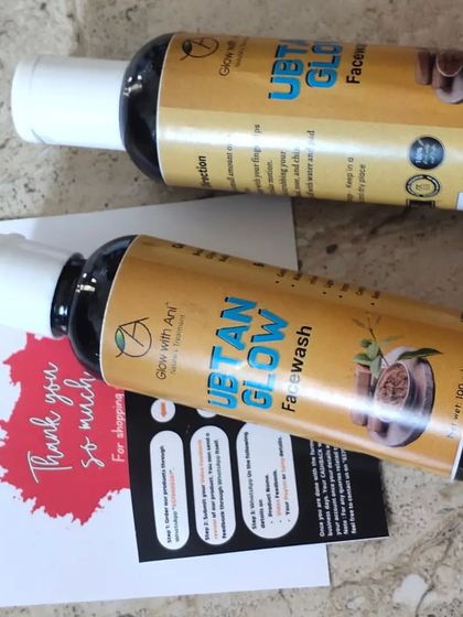 A couple of Ubtan Glow Facewash bottles ready to be shipped, along with a thank you note. I appreciate every single order.