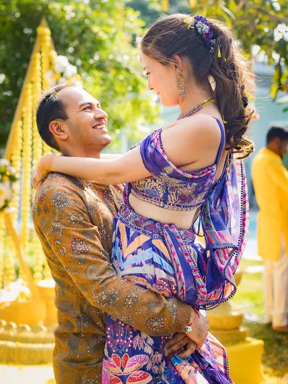The pure, uncontainable joy of a Haldi celebration. We love capturing the vibrant colors and candid emotions of pre-wedding ceremonies.