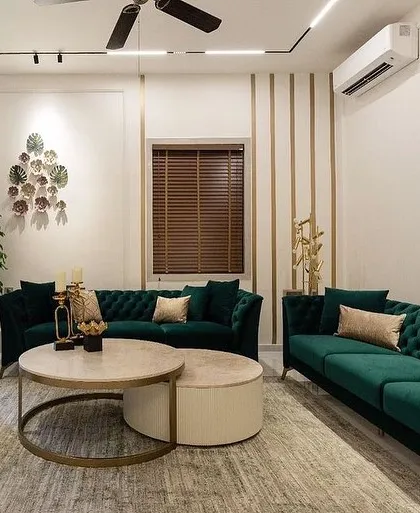 A wider shot of the drawing room, showing how the brass accents in the room and on our coffee tables tie the elegant space together.