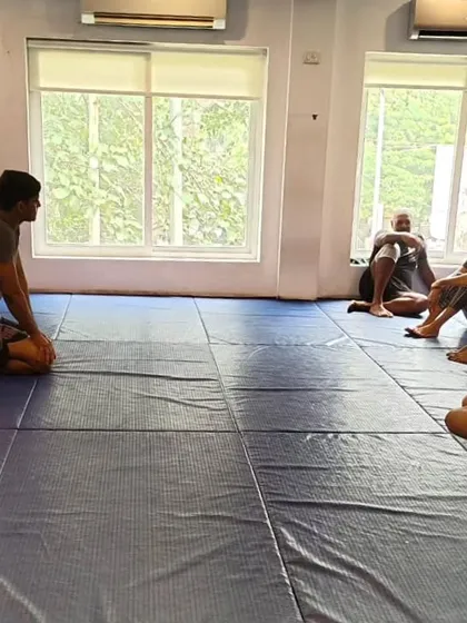 Coach Raajus observing a roll. His creative style of Jiu-Jitsu was a great addition to our team.