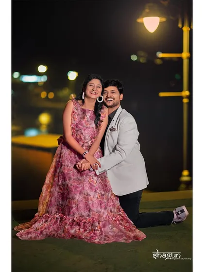 Pure, unadulterated joy. The bright smile on her face, lit by the streetlamp, says it all. I love capturing these moments of genuine happiness during our night shoots.