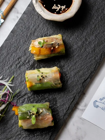 Fresh, healthy, and beautiful. My Vietnamese Rice Paper Rolls are filled with crisp vegetables and herbs, offering a light and refreshing appetizer option. They are perfect for health-conscious corporate events and daytime gatherings.