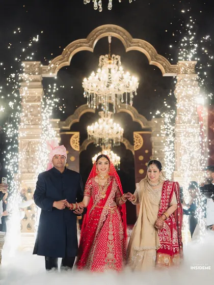 A bridal entry should be pure magic. I designed this moment for the bride to walk with her parents through a path of cold pyros and low-lying fog, leading to an emotional and grand reveal under magnificent chandeliers.