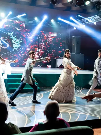 A view from the audience of a sangeet flashmob. We design our choreography to look great from every angle, ensuring all your guests are captivated by the performance.