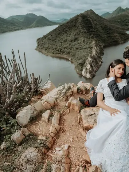 A tender embrace overlooking the stunning lakes and hills of Udaipur. We focus on capturing these gentle, unposed interactions that reveal the true connection between a couple, set against an epic natural backdrop.
