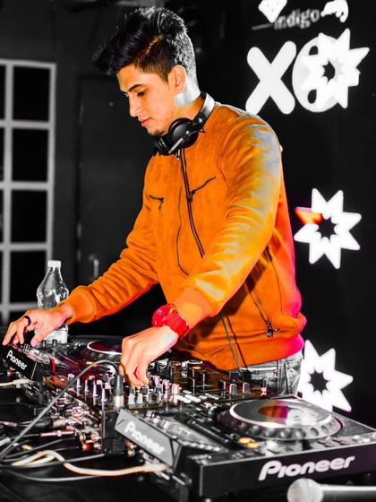 Mixing tracks during a Ladies Night at Indigo XP. I'm constantly adjusting the set based on the crowd's vibe to keep the party going.