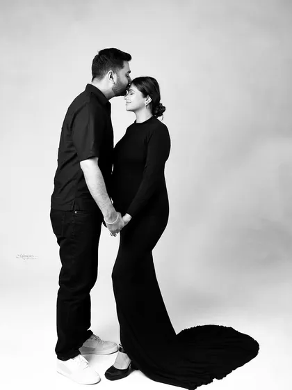 Photography isn't just about clicking; it's about freezing emotions. This black and white portrait captures the quiet strength and love of a couple's bond.