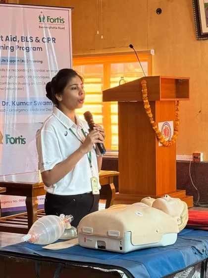 A Fortis Healthcare professional demonstrating life-saving techniques to our team. We partnered with them to get 80 of our members trained and certified in first aid.