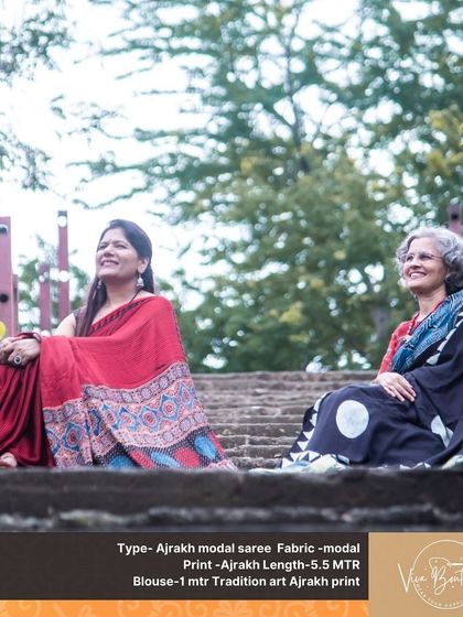 Another shot of our customers enjoying their Ajrakh sarees. The red and black sarees complement each other beautifully, showcasing the variety in our collection.