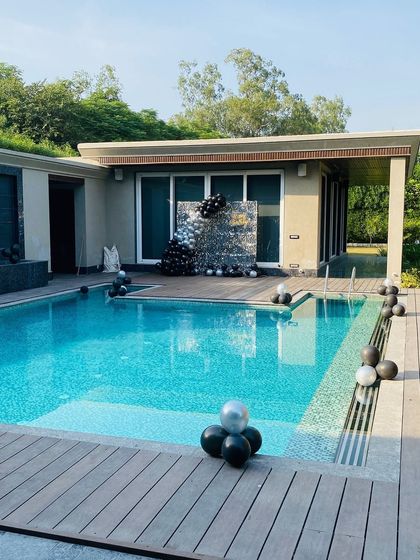 Another wide view of the poolside birthday decoration.