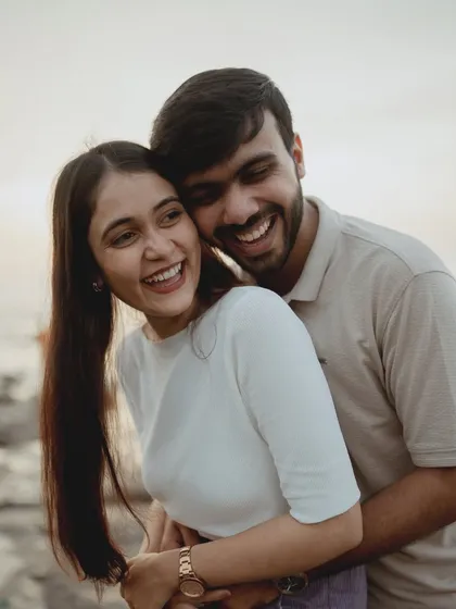 Pure, uninhibited laughter captured during a Mumbai pre-wedding shoot. This candid moment is what it's all about: capturing the real joy and friendship in your love story.