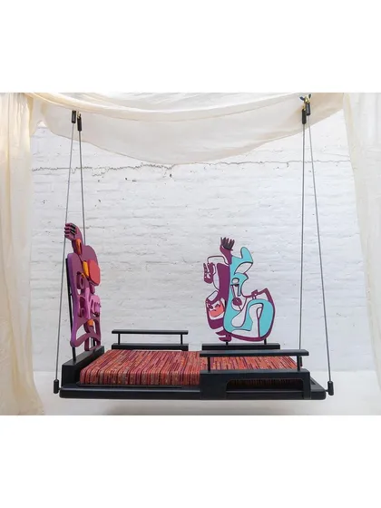 Another possible configuration, with the backrests placed to create a more conversational seating arrangement. The piece invites you to experiment and play.