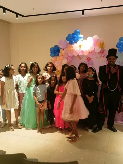 The kids line up for a group photo after the show. It was a fantastic birthday party with a very enthusiastic audience.