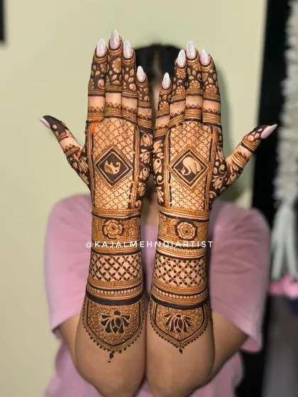 A full backhand design for the groom's sister with elephant motifs.